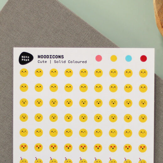 Product Detail Photography Moodicons Sticker Sheet – Cute on desk with notebook