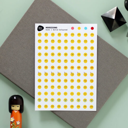 Product Photography Moodicons Sticker Sheet – Cute on desk with notebook, kokeshi doll kawaii and geometric stones