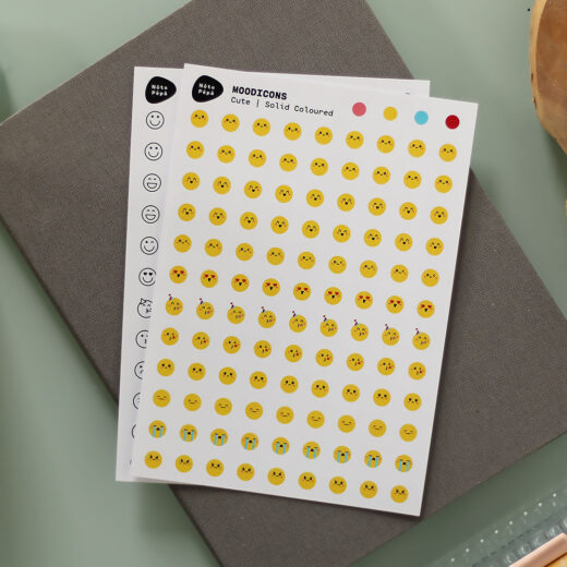 Scene Product Photography Moodicons Sticker Sheet – Minimal & Cute style on desk with notebook