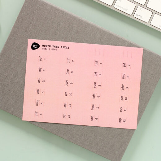 Noto Pepa Peachy Pink Abbreviated Month Tab Stickersheet Cute style on work desk and notebook with keyboard